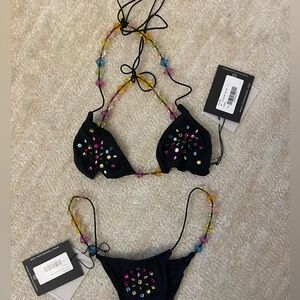 It’s now cool bikini
Selling set (top xl, bottom L) 
Tags on 
Brand new